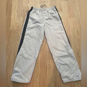 Nike wind pants, size medium. Silver